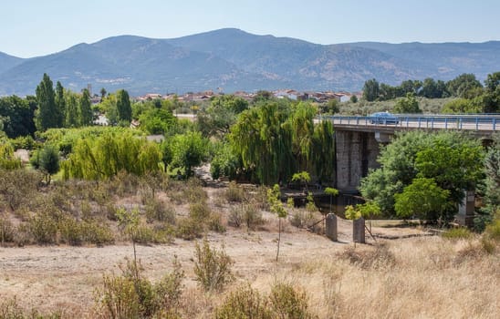 CC-168 bridge road over Abadia natural swimming pool area. Caceres, Extremadura, Spain