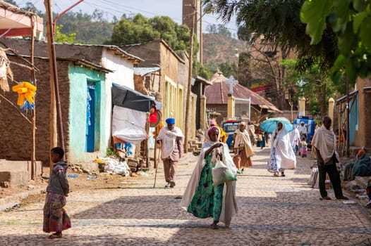 AXUM, ETHIOPIA, APRIL 27th.2019: Elder tigray women return from the morning Mass at the church of Our Lady of Zion on April 27, 2019 in Aksum, Ethiopia Africa