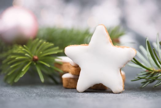 Cinnamon stars, traditional german christmas cookies, gingerbread, empty copy space, fir branch