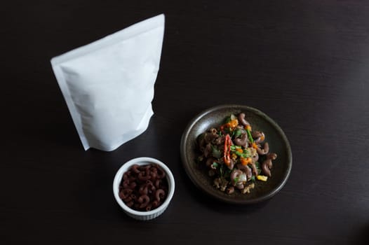 Macaroni with spicy with basil and minced pork . white space package for text