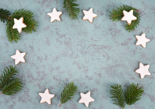 Cinnamon stars, traditional german christmas cookies, gingerbread, empty copy space, fir branch
