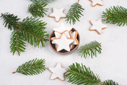 Cinnamon stars, traditional german christmas cookies, gingerbread, empty copy space, fir branch