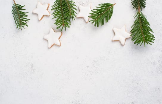 Cinnamon stars, traditional german christmas cookies, gingerbread, empty copy space, fir branch
