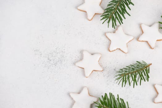 Cinnamon stars, traditional german christmas cookies, gingerbread, empty copy space, fir branch