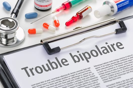Clipboard with the text Bipolar disorder in french - Trouble bipolaire