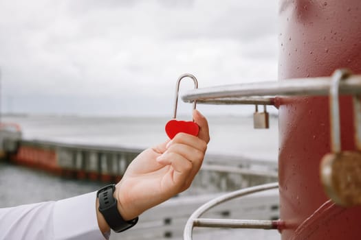 The bride and groom locks. Newlyweds hang the lock symbolizing everlasting love on the wedding day.