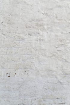 White ancient walls of the monastery is photographed close up