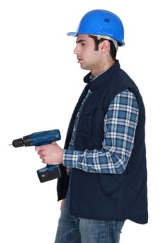 craftsman holding a drill