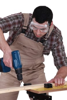 Handyman using a screwdriver