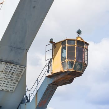 Particular of an Old crane at the dock of the port