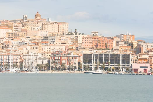 Cagliari , Seafront and Port. Roma Street and Palace of the Regional Council of Sardinia.