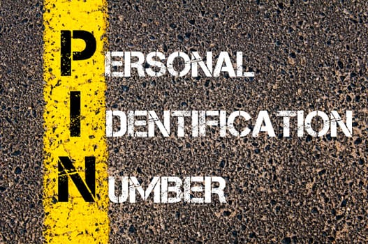 Acronym PIN - Personal Identification Number. Business Conceptual image with yellow paint line on the road over asphalt stone background.