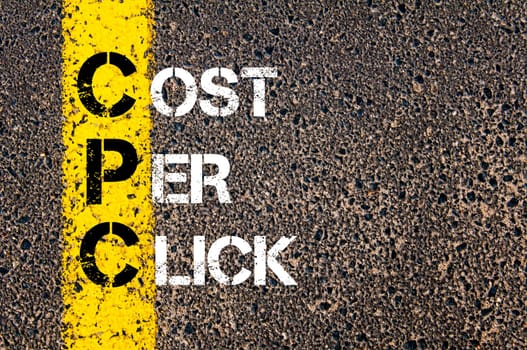 Acronym CPC- Cost Per Click. Business Conceptual image with yellow paint line on the road over asphalt stone background.