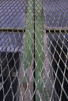 Detail of metal protection fence decorated, painted steel with shapes