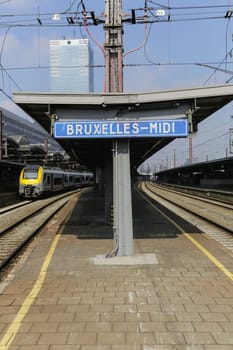 Rail tracks and trains in the Brussels South Railway Station