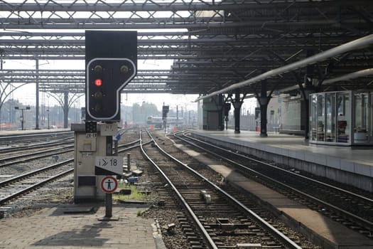 Rail tracks and trains in the Brussels South Railway Station