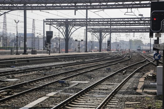 Rail tracks and trains in the Brussels South Railway Station
