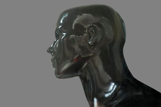 Black mannequin bust profile. Isolated over grey background