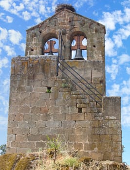 Isolated bell tower of Aceituna, Rural village in Algon Valley. Caceres, Extremadura, Spain