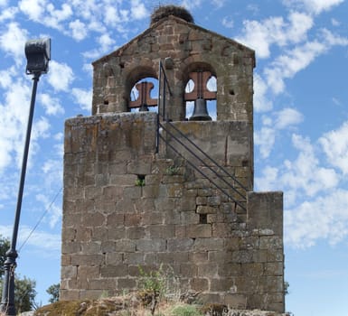 Isolated bell tower of Aceituna, Rural village in Algon Valley. Caceres, Extremadura, Spain