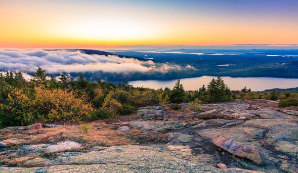 Scenic sunset in Acada National Park as seen from the top of Cadillac Mountain
