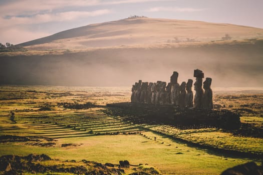 Sunrise over Moai stone sculptures at Ahu Tongariki, Easter island, Chile
