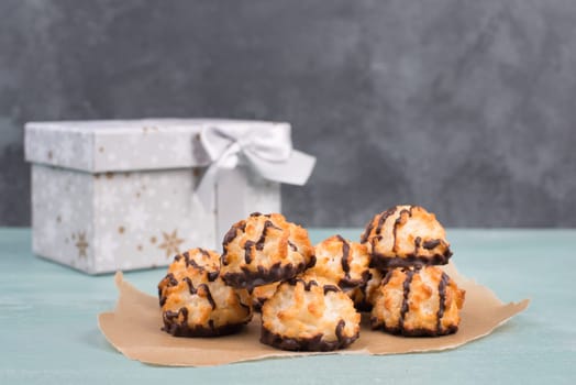 Coconut macaroons on a textured blue background