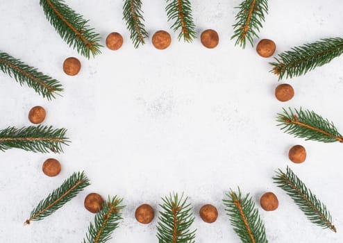 Marzipan potatoes, in german called Marzipankartoffeln, with cacao powder, sweets for christmas, empty copy space