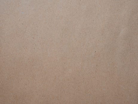 Brown paper texture background of recycled paperboard sheet
