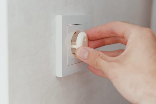 Electric outlet, child safeguard installation