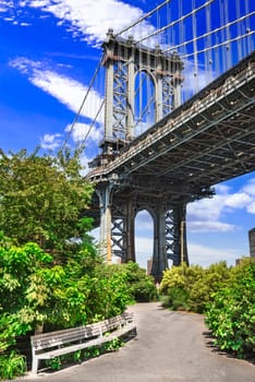 New York City, United States. Brooklyn old buildings and Washington Bridge in Dumbo.