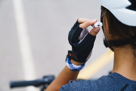 sport girl wearing wireless earphone
