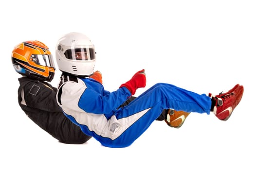 Racing drivers in racing position with complete gear isolated in white