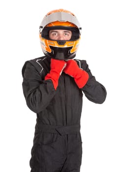 Racing driver posing with helmet isolated in white