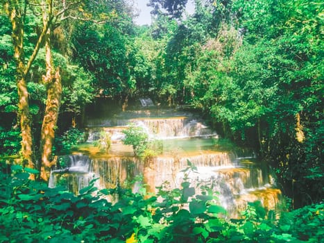 Huay Mae Khamin waterfall in Kanchanaburi, Thailand South east asia Jungle landscape with amazing turquoise water of cascade waterfall at deep tropical rain forest. travel landscape and destinations