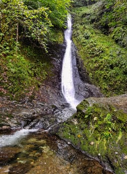 Whitelady waterfall in rain - Lydford Gorge, Dartmoor National Park, Devon, United Kingdom