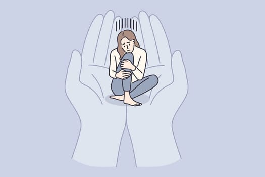 Depression, grief and support concept. Young sad depressed girl cartoon character sitting in human hands palms embracing holding her vector illustration