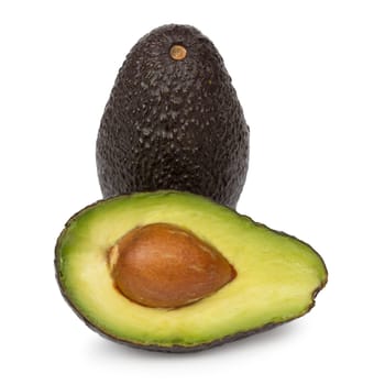Whole avocado and half of avocado isolated on white