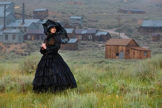 Girl Wearing Vintrage Gown in Bodie Ghost Town California