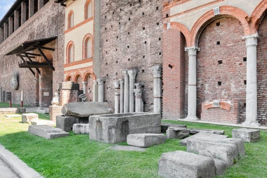 Inside the Sforza Castle (Castello Sforzesco) in Milan (ITALY). One of the main travel attractions of Milan, this castle was built in 15th century by Duke of Milan Francesco Sforza. Milan, ITALY - June 22, 2020.