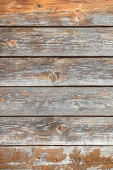 Old brown wooden wall background. Texture close up.