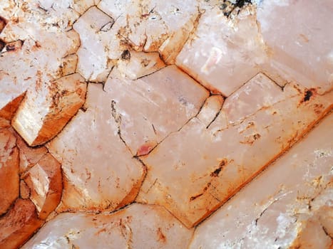 Close up of orange red rose quartz stone