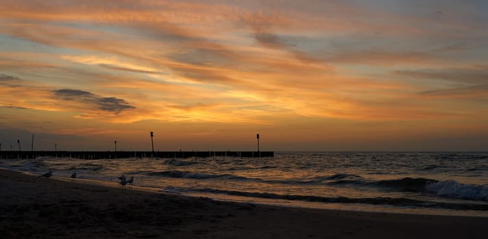 Evening atmosphere on the beach of the Polish Baltic coast near Kolobrzeg after sunset
