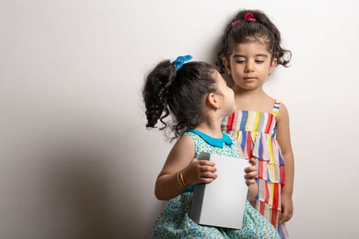 Little girl  holding a small box in hands, editable mock-up series template ready for your design, faces selection path included.