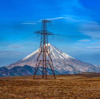 The high-voltage transmission lines and the Vilyuchinsky volcano, Kamchatka Peninsula, Russia