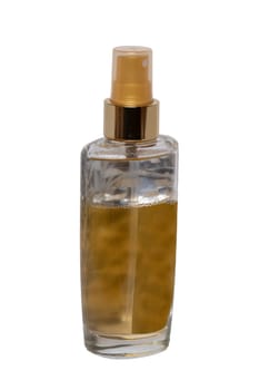 Cosmetic labels. Close-up of a gold brown elegant female parfum glass bottle isolated on a white background. Copy space for your own label. Macro. Advertising.
