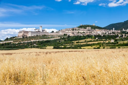 Assisi village in Umbria region, Italy. The town is famous for the most important Italian St. Francis Basilica (Basilica di San Francesco)