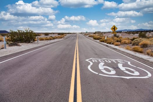 Route 66 in the desert with scenic sky. Classic vintage image with nobody.