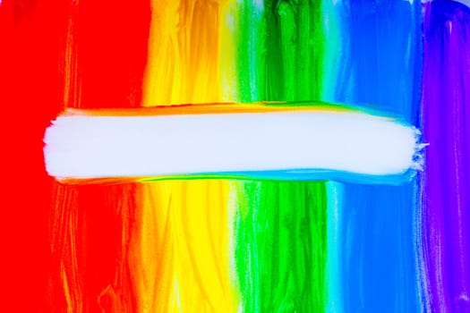 Colorful lines drawn vertically with paint in the form of a rainbow with a white place for text in the middle on a white background. top view, flat lay, copy space, isolate. High quality photo