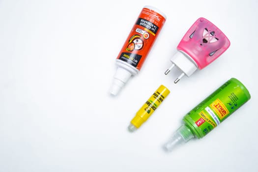 Mosquito repellents are lying in a corner on a white background. High quality photo